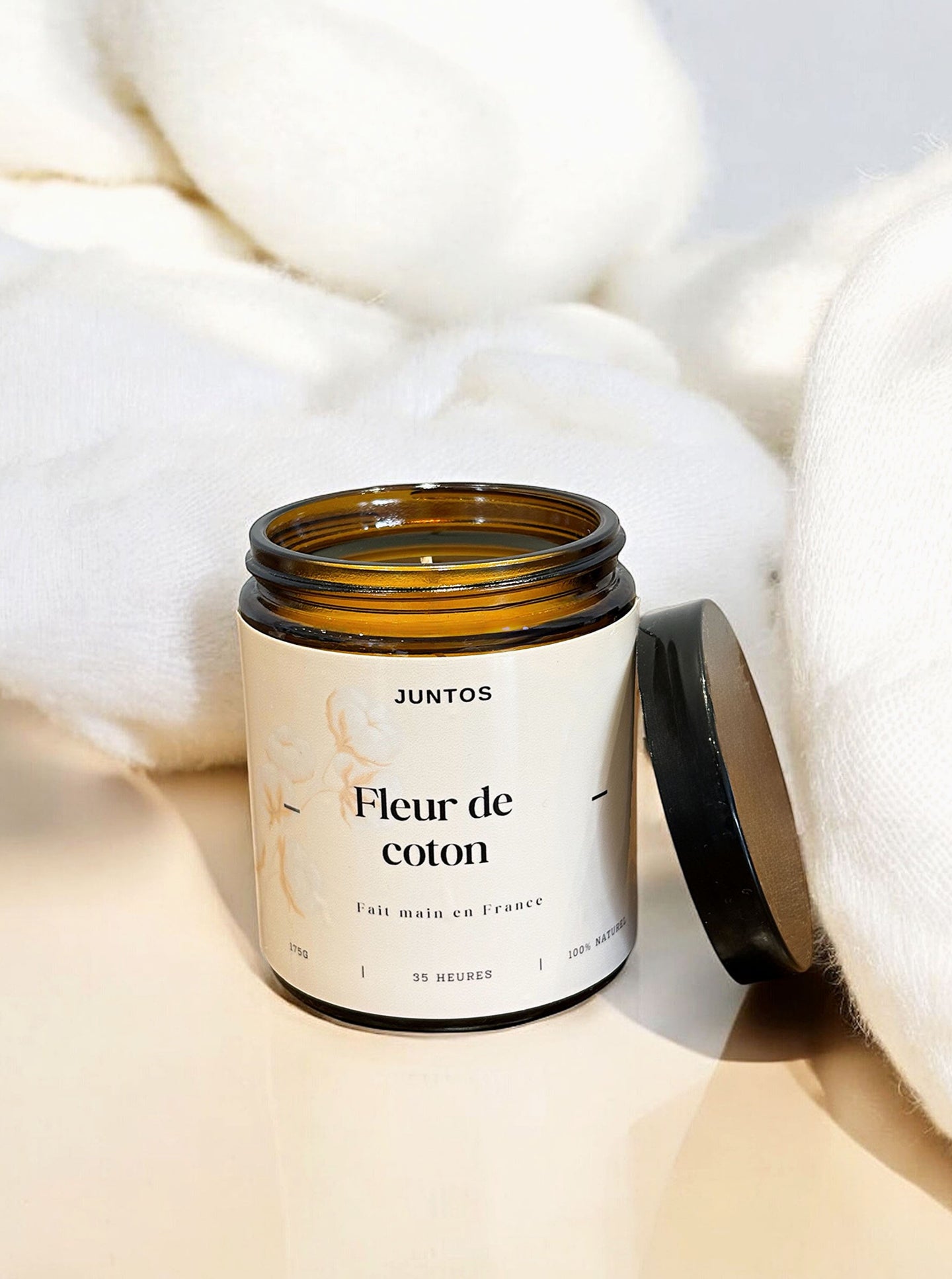 Bougie parfumée Fleur de Coton en pot ambré réutilisable, cire végétale et parfum de Grasse sans produits chimiques.